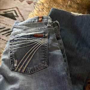 7 For All Mankind Women's Light Blue Bootcut Jeans with Curved Pocket Stitching